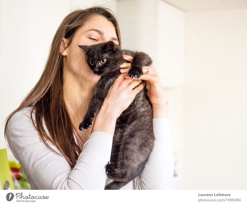 girl hugging cat Pet Cat Kissing Embrace cuddle young cat young animal Girl love Animal lover Cute housecat Lifestyle Funny Humor Portrait photograph