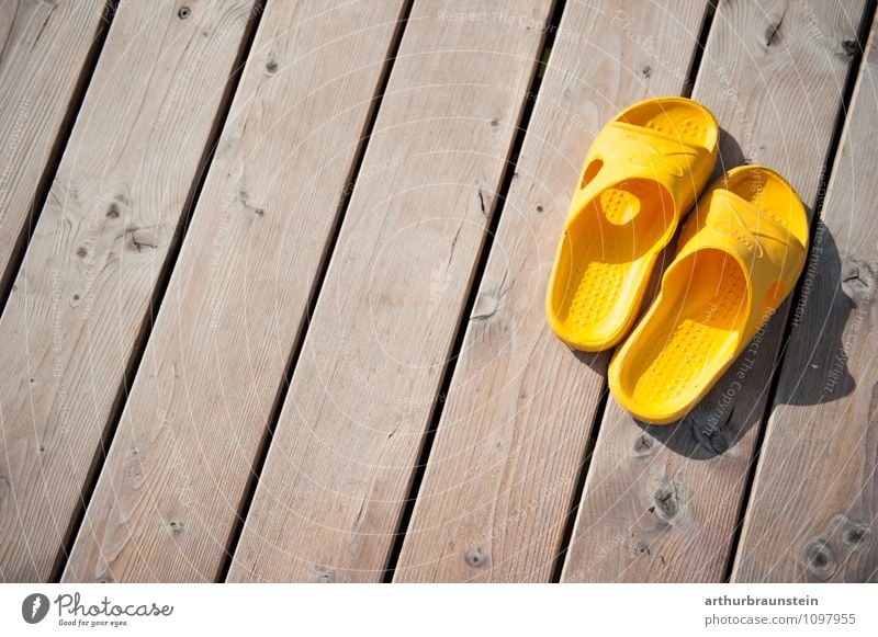 bath slippers at the jetty Lifestyle Joy Athletic Wellness Calm Swimming & Bathing Leisure and hobbies Sunlight Summer Lake Terrace Pedestrian Footwear Yellow