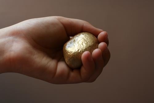 Rhine gold nugget Child Hand Fingers 1 Human being 8 - 13 years Infancy Stone Gold Glittering Happy Avaricious Nuggets false gold False Retentive Donate Find