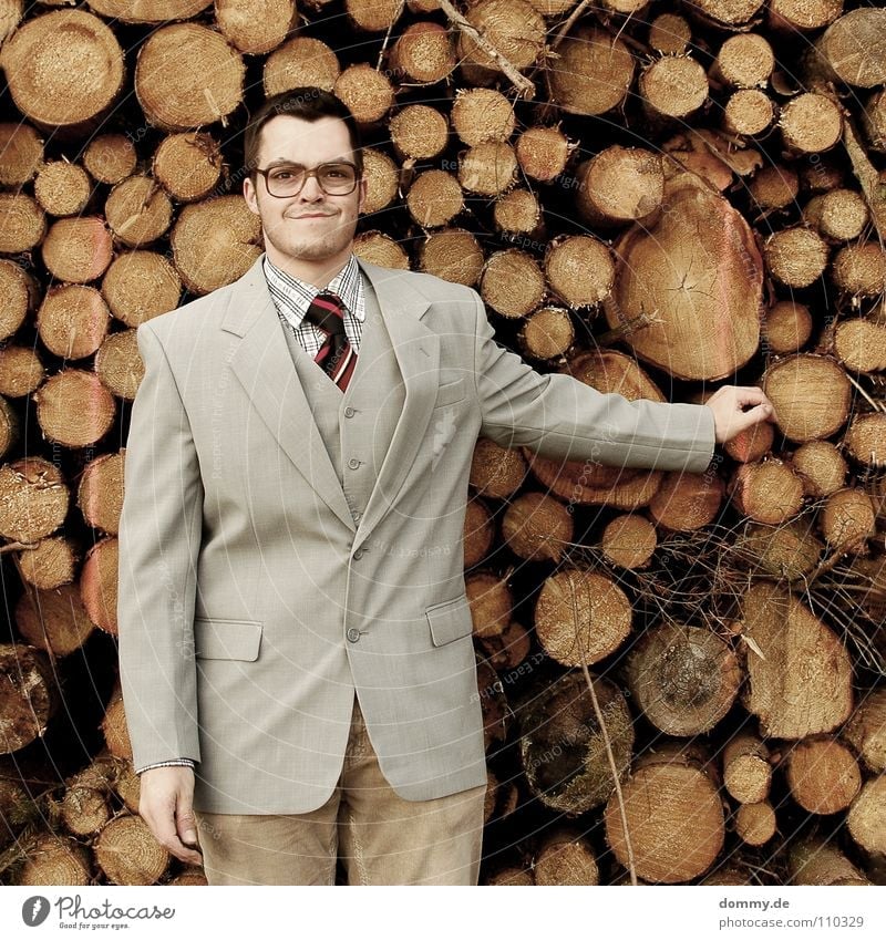 I always need it! Man Fellow Suit Jacket Vest Gray Brown Pants Tie Striped Hand Bright Theft Purloin Tight-fisted Fantastic Eyeglasses Stack of wood Wood