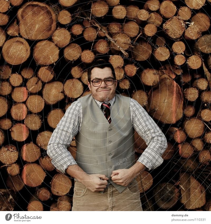 but now Man Fellow Suit Jacket Vest Gray Brown Pants Tie Striped Hand Bright Theft Purloin Tight-fisted Fantastic Eyeglasses Stack of wood Wood Firewood Heat