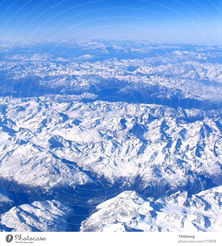 AlpsOverview Aerial photograph White Valley Relief Canyon Austria Horizon Background picture Mountain Europe Winter Aviation Snow Geography Topography Moody