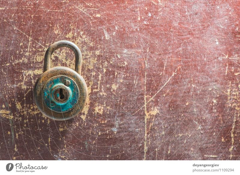 Old vintage padlock on wooden background Door Metal Steel Rust Dirty Retro Brown Safety Protection Safety (feeling of) Padlock Antique Grunge Object photography