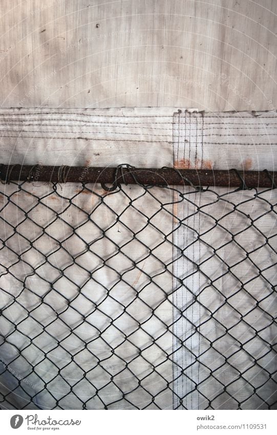 Behind grids Gloomy Wire netting Covers (Construction) Protection Stitching Firm Colour photo Exterior shot Close-up Detail Deserted Copy Space top