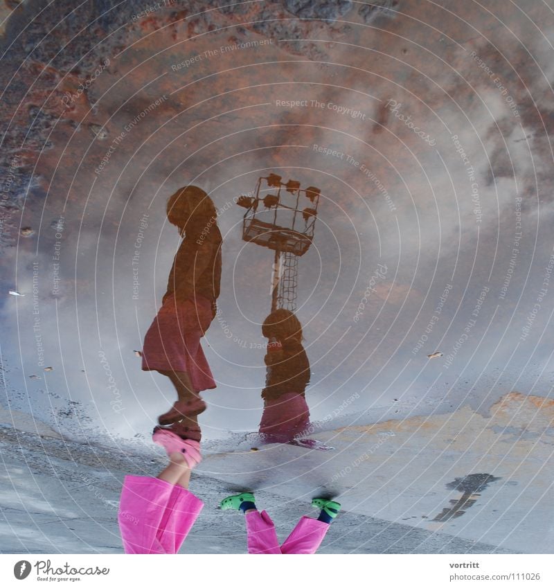 2 h before departure Child Girl Reflection Puddle Pink Style Inverted Clouds To go for a walk Gray Daughter Floodlight Rust Sky Trashy Street
