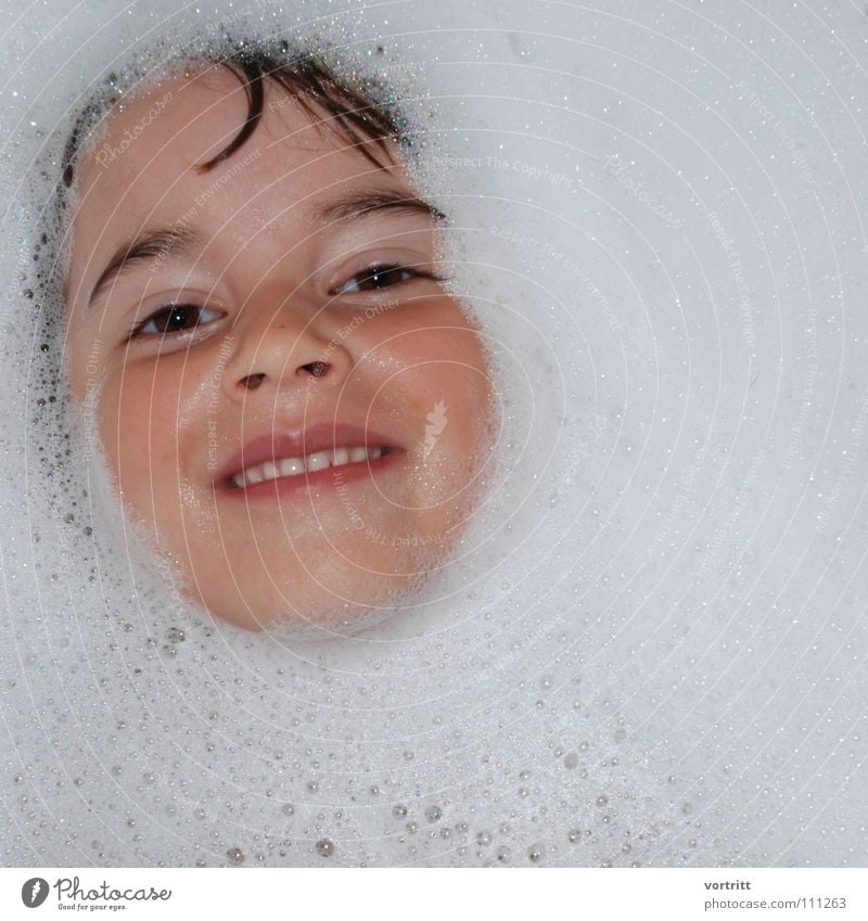 emergence Child Girl Bathtub Foam Dive Style Bathroom Eyes Mouth Hair and hairstyles Water Snow Face Blow