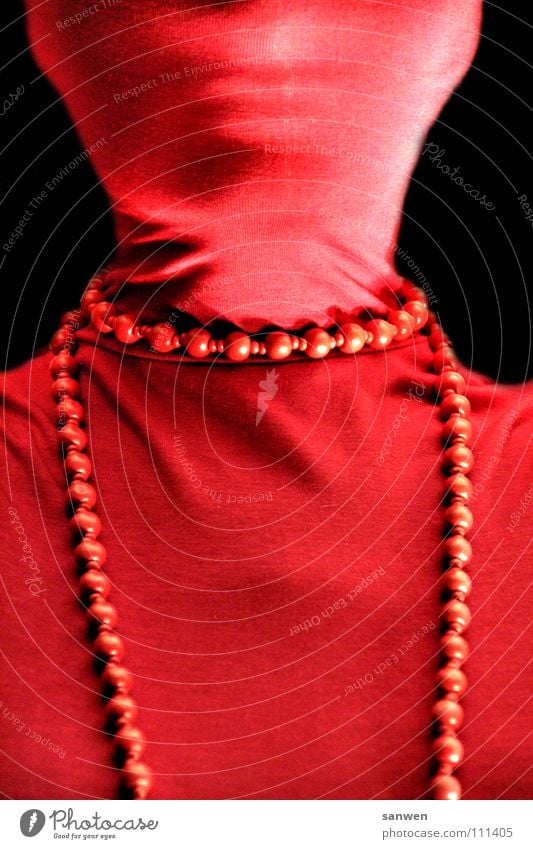 lady in red dress Woman Red Black Sweater Roll-necked sweater Lips Jewellery Upper body Mysterious Chin Clothing Luxury red on red Dark background Chain