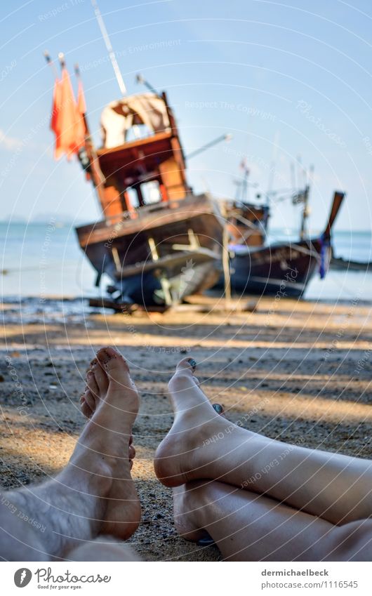 On the beach are disturbed by two ships Landscape Sand Water Sky Summer Beautiful weather Beach Bay Fishing boat Lie Free Friendliness Bright Blue Brown Joy