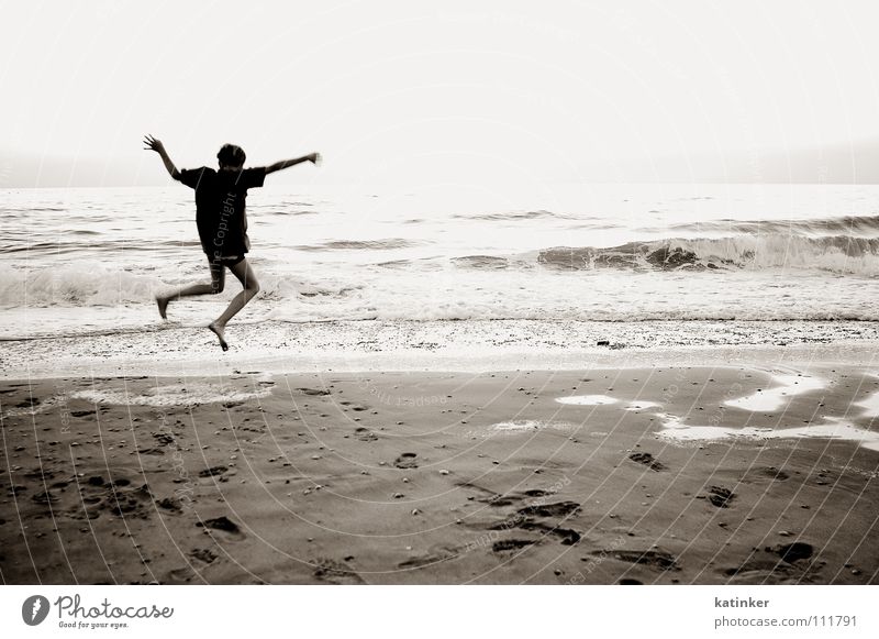 home Ocean Jump Applause Homesickness Wanderlust Beach Black White Moody Joy Black & white photo Sepia Sand