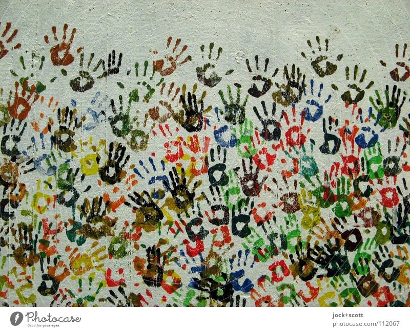 hand in hand Joy Hand Street art Wall (building) Imprint Touch Together Many Society Inspiration Complex Creativity Teamwork Participation Play of colours