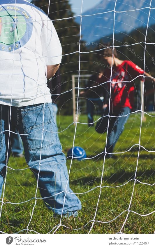 Football goal Leisure and hobbies Playing Soccer Summer Summer vacation Sun Sports Ball sports Sports team Football pitch Child Human being Masculine