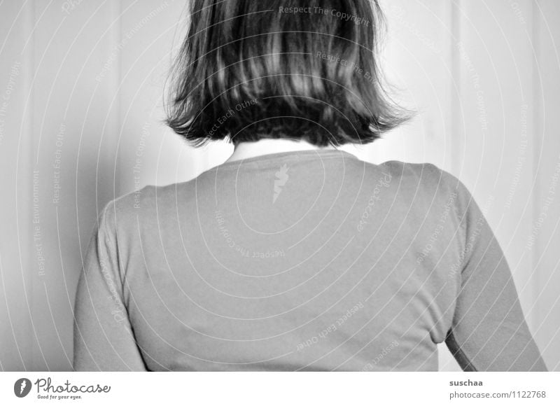communication breakdown Woman Young woman Head Back Behind Rear view Hair and hairstyles T-shirt Black & white photo