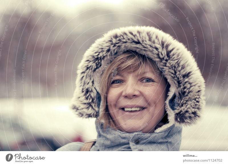 Get dressed warm! Young woman Youth (Young adults) Woman Adults Head Winter Pelt Hooded (clothing) Hooded jacket Smiling Laughter Cold Good mood Subdued colour