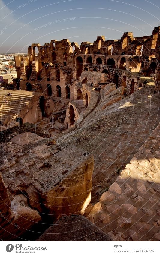 from inside of arena Sand Sky Clouds Rock Ruin Stone Historic Brown Yellow Gray Red Black White el jem Arena coliseum gold Tunisia brick ancien curved arcuated