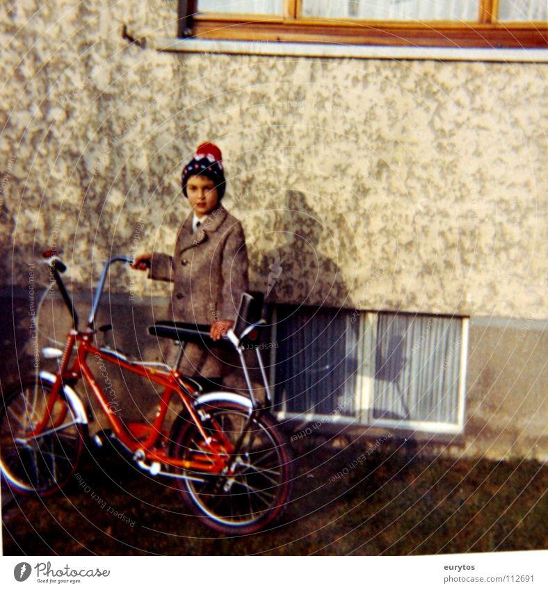Bonanza - Bike Bicycle Wall (building) Autumn November Cold Cap Coat Child Peace Boy (child) Bonanza wheel Germany