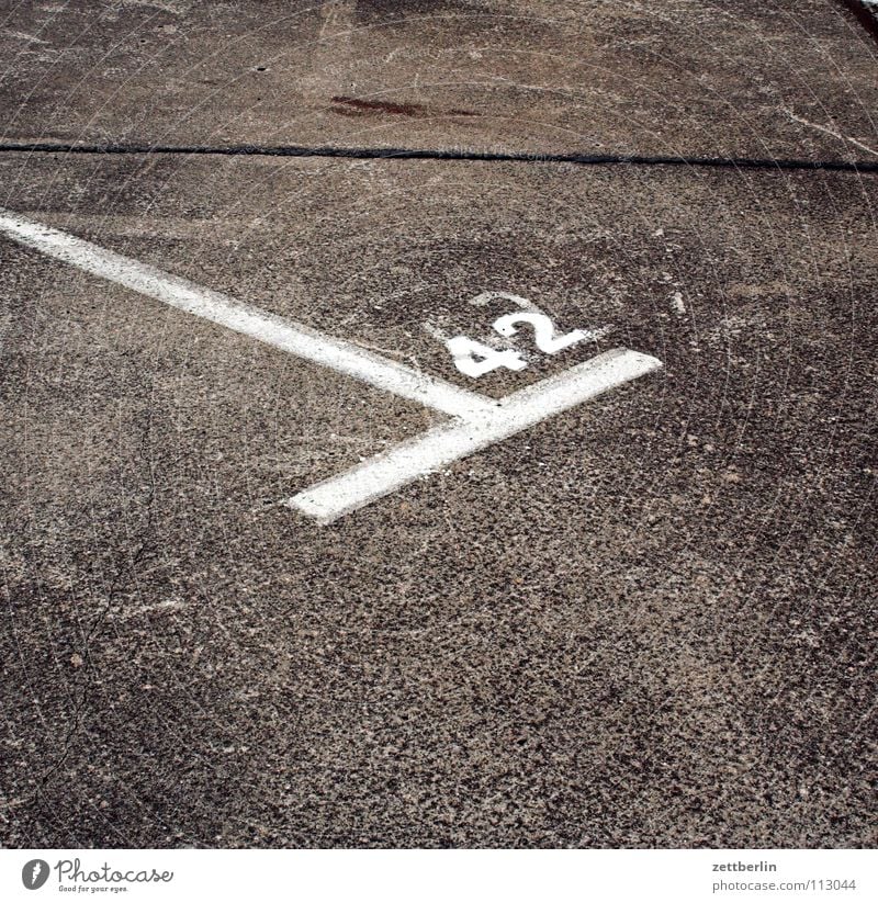 42 Parking lot Stripe Digits and numbers Concrete Asphalt Traffic lane Pavement Answer Traffic infrastructure Transport Signs and labeling parking lot marking