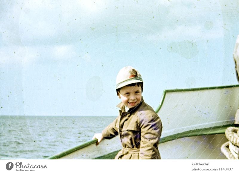 Lutz, Hiddensee, 1966 Baltic Sea Ocean Coast Navigation Steamer Ferry Sky Copy Space Child Boy (child) Cap Looking into the camera Face to face Student