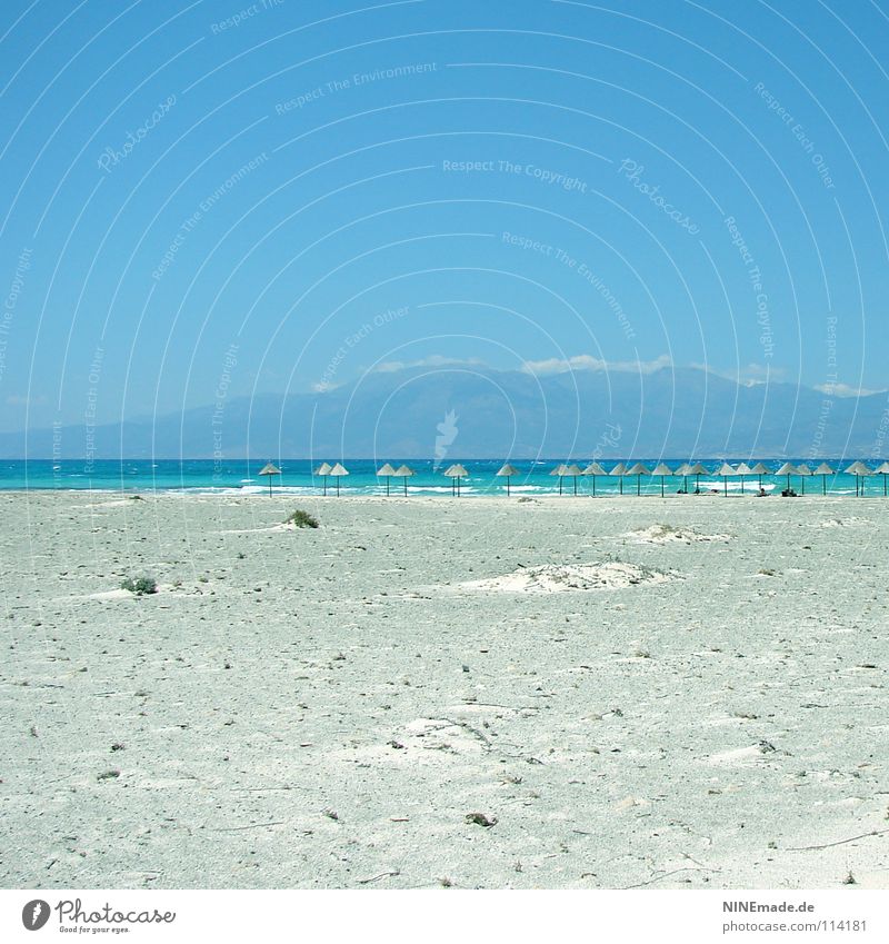 HOLIDAYS Beach Summer Physics Vacation & Travel Sunshade Wood Sky blue Crete Loneliness Empty Calm Vacation mood Greece Waves Ocean Horizon Sandy beach