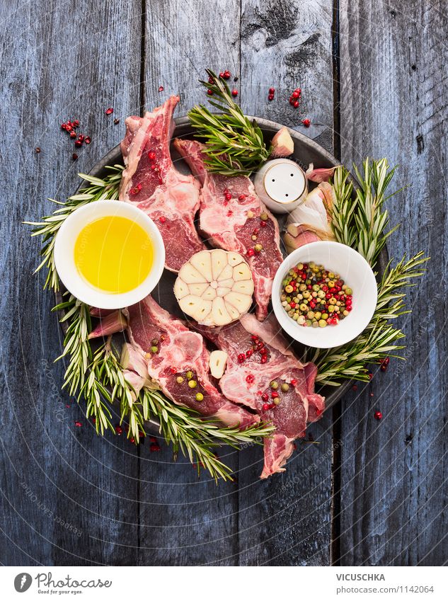 Raw lamb cutlet with oil, rosemary and spices Food Meat Nutrition Dinner Banquet Organic produce Diet Style Design Healthy Eating Life Table Kitchen