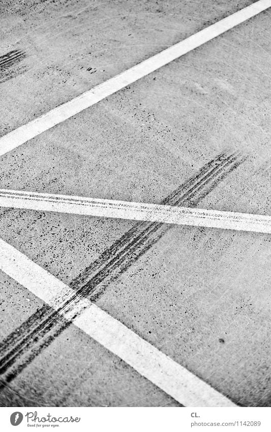 tracks Transport Traffic infrastructure Road traffic Motoring Street Lanes & trails Parking lot Line Asphalt Ground Skidmark Safety Black & white photo