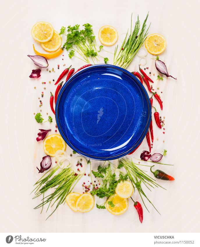 Empty blue plates framed with fresh herbs and spices Food Vegetable Lettuce Salad Fruit Herbs and spices Nutrition Banquet Organic produce Vegetarian diet Diet