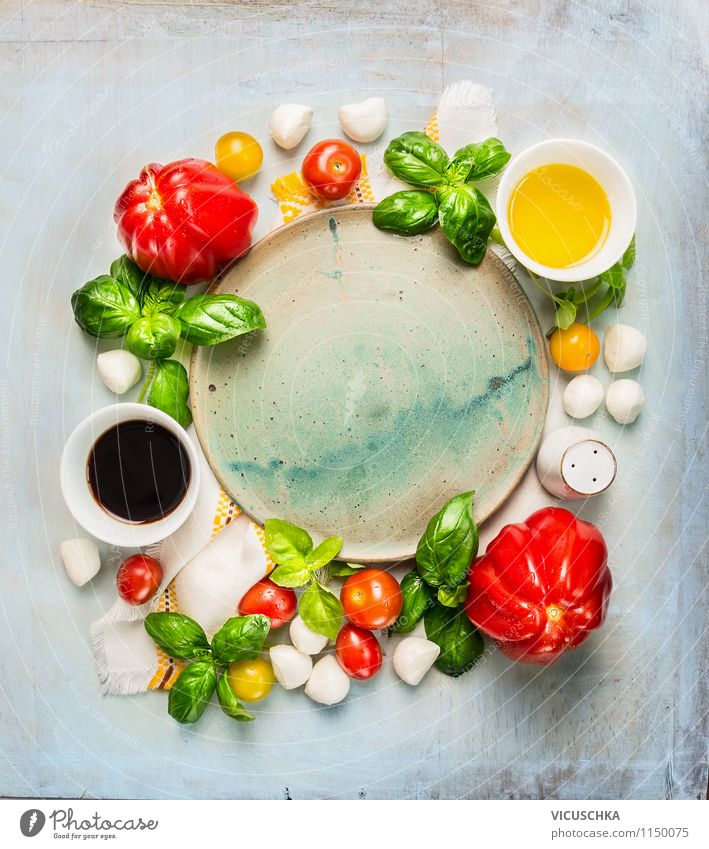 Empty plates with tomatoes and mozzarella ingredients Food Cheese Dairy Products Vegetable Herbs and spices Cooking oil Nutrition Lunch Banquet Organic produce
