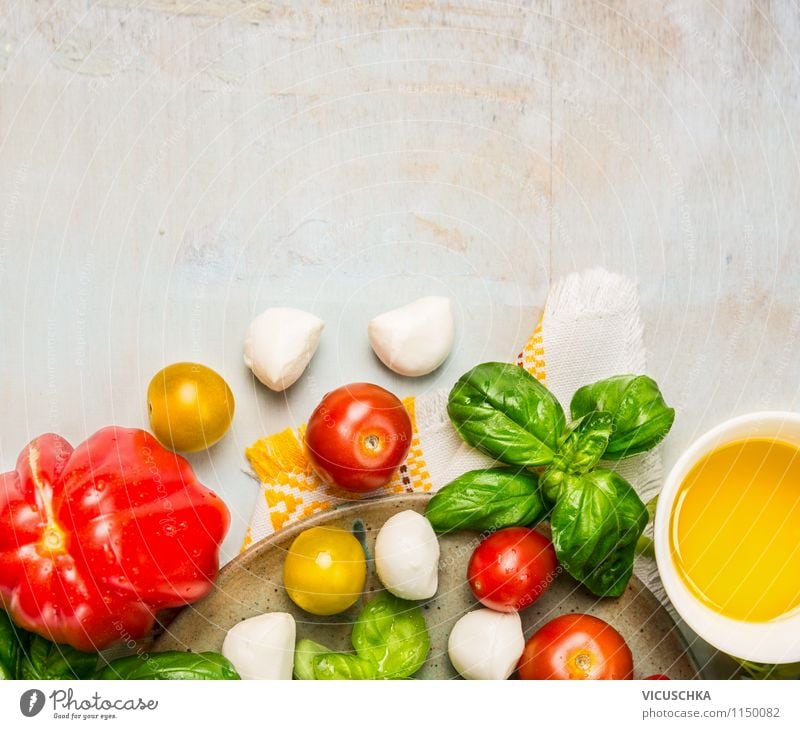 Salad with tomatoes and mozzarella make Food Cheese Vegetable Lettuce Herbs and spices Cooking oil Nutrition Lunch Organic produce Vegetarian diet Diet