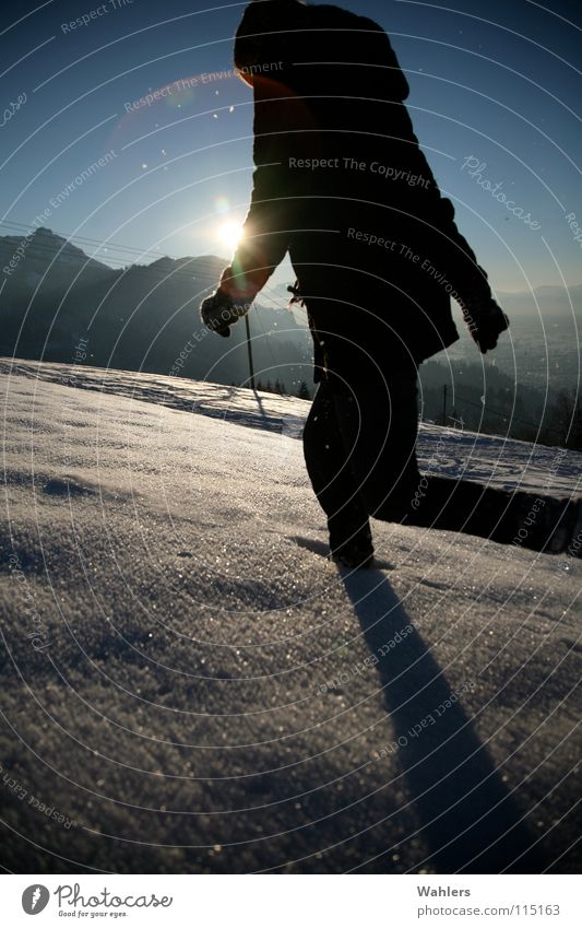 Tracks in the snow III Winter To go for a walk Speed Horizon Dornbirn Federal State of Vorarlberg Austria Woman Coat Back-light Snow Walking Running Movement
