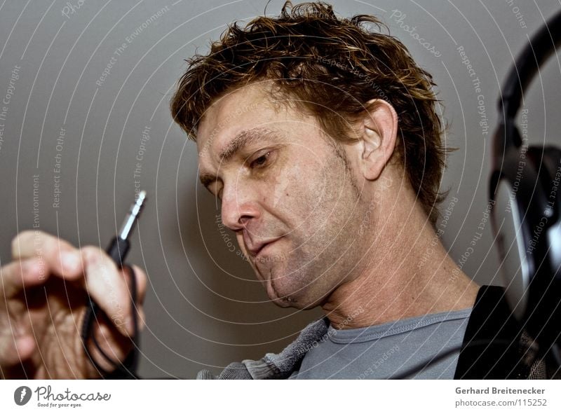 headroom Man Portrait photograph Headphones Connector Insert Plugin Music unplugged Connection Associated Listening Sense of hearing Search Concert Concentrate