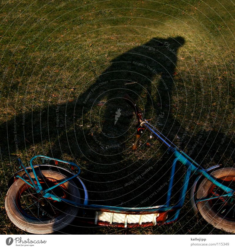 shadow scooter Toys Playing Childhood dream Vintage car Nostalgia Man Green Grass Green space Dream Sporting event Joy Coil Bicycle play fun Human being Lawn