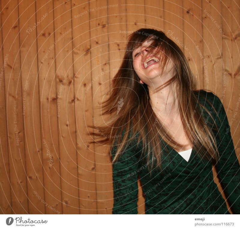 laughing flash Woman Youth (Young adults) Rocking out Party Authentic Wooden wall Air Breeze Beautiful Sweet Beauty Photography To enjoy Good mood Movement