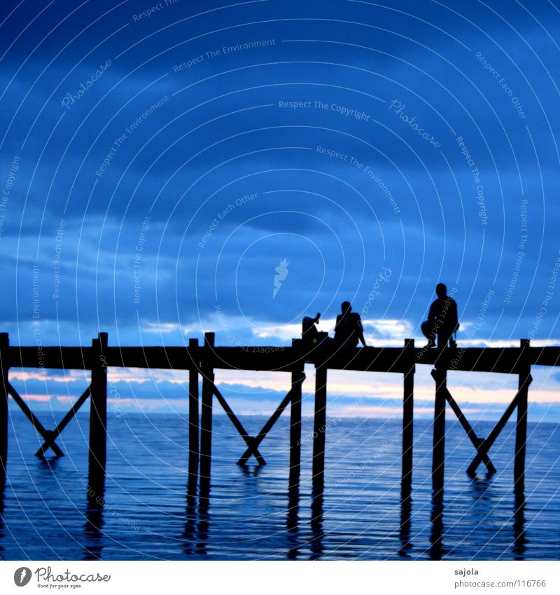 chatting on the jetty Contentment Relaxation Vacation & Travel Freedom Ocean Human being Masculine Man Adults 3 Water Sky Clouds Bridge Crucifix Blue Black