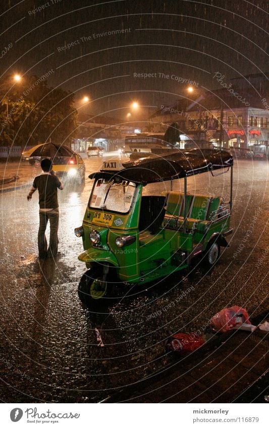 bangkok monsoon Monsoon Thailand Bangkok Gale Taxi Stream Umbrella Torrents of water Town Night Ignore Extreme Transport Light Artificial light Trash Dark Black