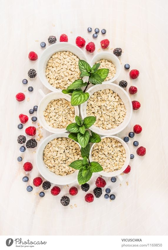 Oatmeal, mint and berries - family breakfast. Food Fruit Grain Herbs and spices Nutrition Breakfast Organic produce Vegetarian diet Diet Bowl Style Design