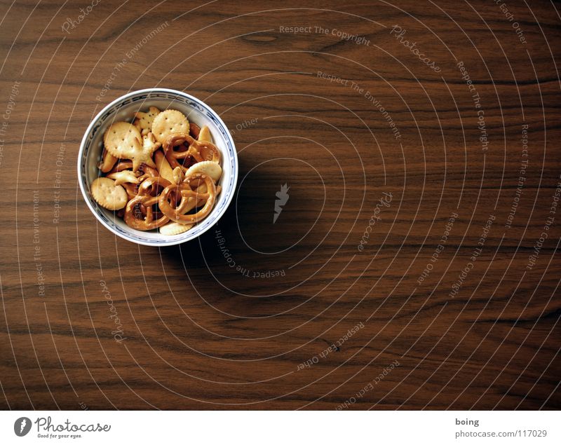 solid food G - G full like monkey Nibbles Food photograph Bowl Neutral Background Bird's-eye view Tabletop Wood grain Copy Space right Copy Space bottom Pretzel