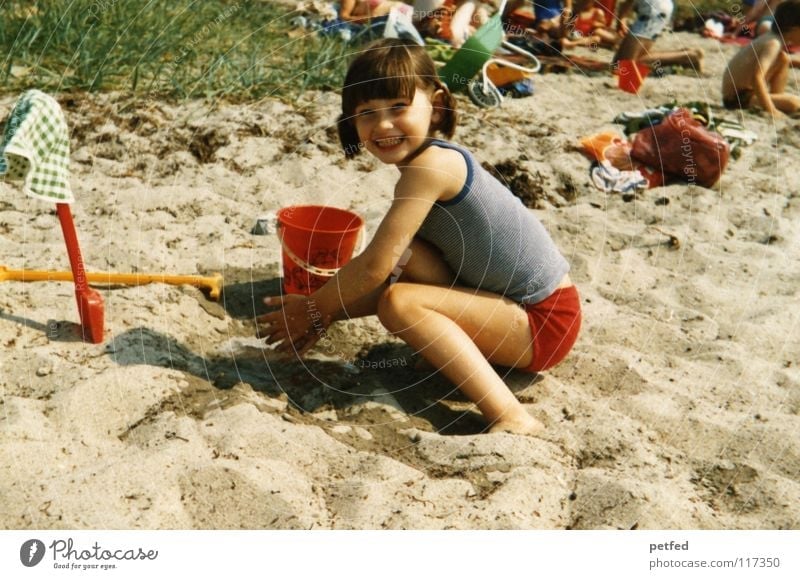 Vacation in the 70's II Former Seventies Child Girl Beach Fehmarn Vacation & Travel Collection Wind Ocean Playing Sandcastle Stone Island Relaxation Life Joy