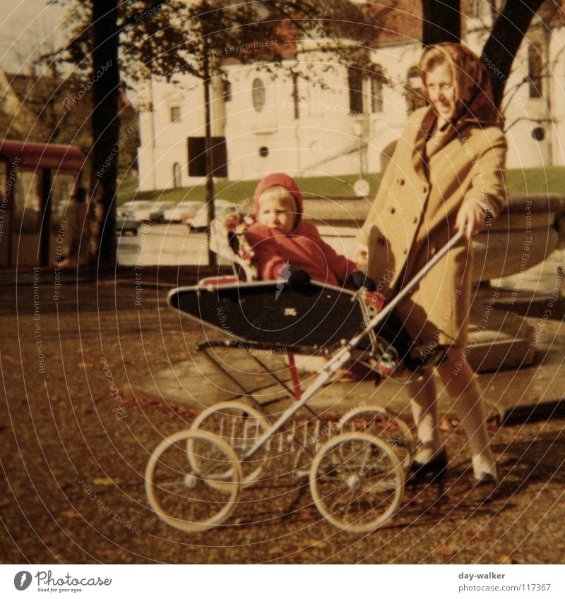 Teita go (drive) Mother Baby carriage Munich Curiosity Retro Together Toddler Trip Exterior shot Historic