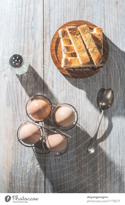 Boiled eggs breakfast table Nutrition Breakfast Lunch Diet Plate Spoon Table Fresh Delicious Natural Soft Brown Yellow White Cooking Egg toast food wooden