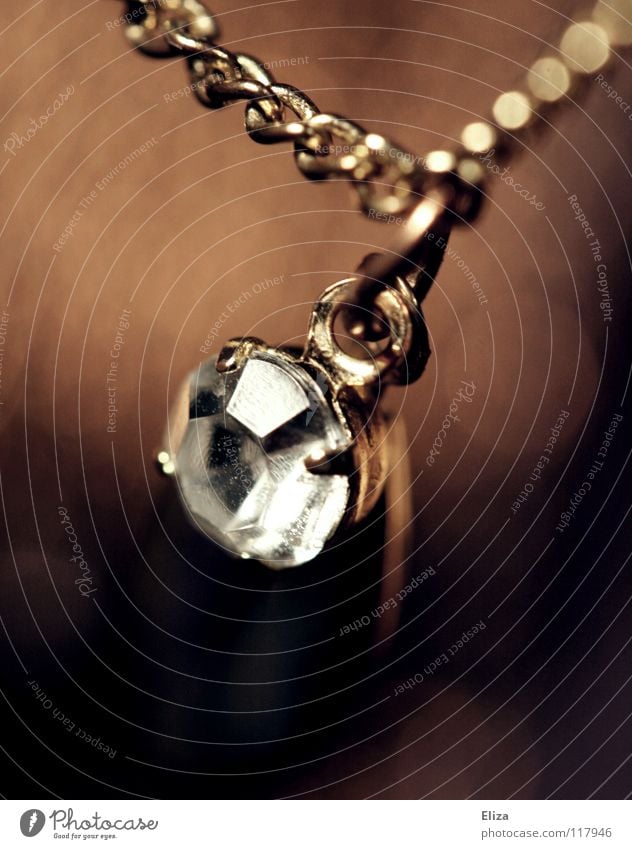 Golden chain with a gemstone pendant Elegant pretty Accessory Jewellery Stone Old Glittering Brown Pendant Diamond Chain Precious Expensive Glamor Noble Legacy