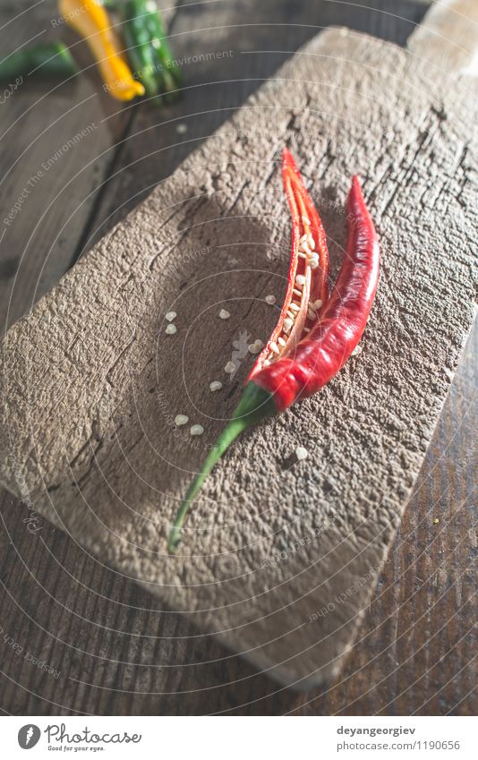 Hot peppers on wooden kitchen Vegetable Herbs and spices Table Kitchen Fresh Red White Colour board chili food Ingredients Spicy background Cut chopping cutting