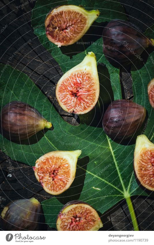 Figs in yellow bowl Fruit Diet Exotic Nature Autumn Leaf Fresh Natural Juicy Green Red ripe food wood Organic Purple sweet background healthy Ingredients wooden