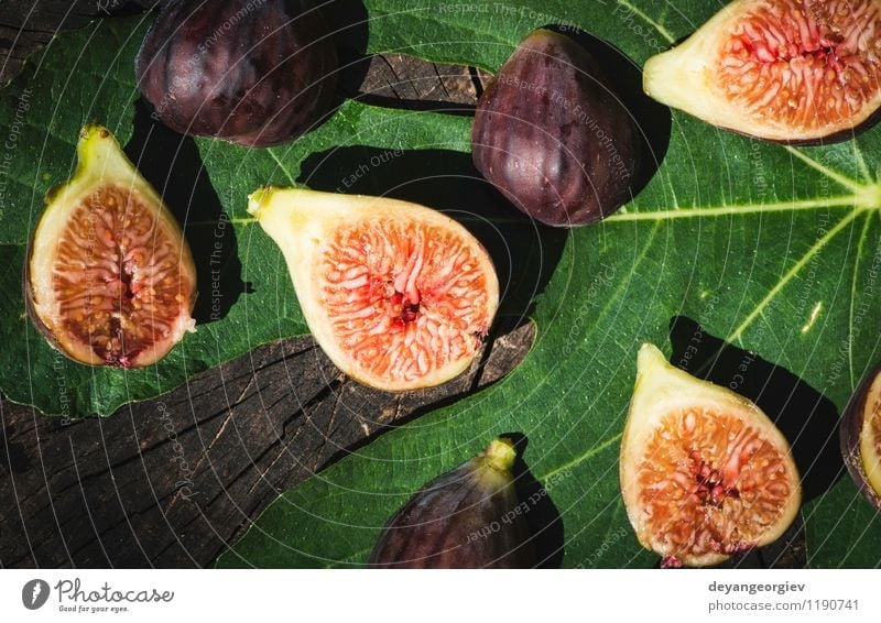 Figs in yellow bowl Fruit Diet Exotic Nature Autumn Leaf Fresh Natural Juicy Green Red ripe food wood Organic Purple sweet background healthy Ingredients wooden