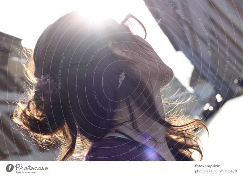 Young long haired woman looks away into the light Young woman Woman Adults Eyeglasses Dream Sadness Alley Youth (Young adults) Back-light Half-profile portrait