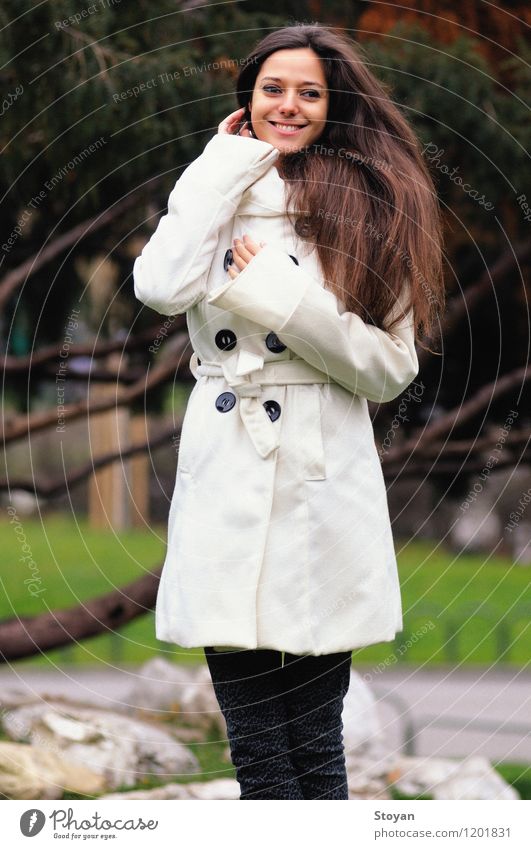 winter girl with smile and long hair Human being Woman Adults Life 1 18 - 30 years Youth (Young adults) Nature Plant Autumn Weather Wind Park Fashion Coat Wood