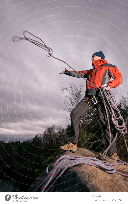 on mountain II Mountaineering Gale Clouds Cold Loneliness Adventure Masculine Sports Playing Rock Climbing Rope Safety Throw Hero Freedom Exterior shot