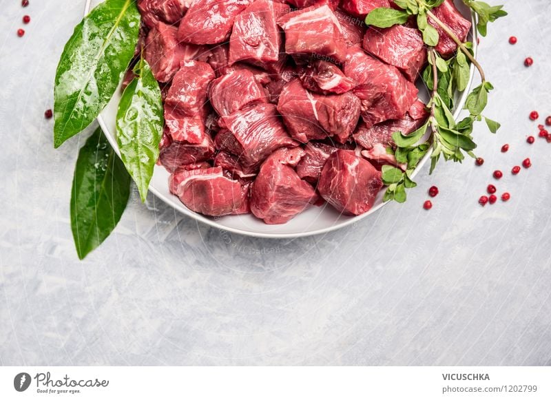 Beef for goulash with fresh bay leaf Food Meat Herbs and spices Nutrition Lunch Dinner Banquet Organic produce Diet Bowl Style Design Healthy Eating Simple