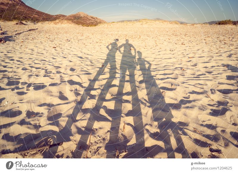 Family on the beach Human being Family & Relations Partner 3 Group Nature Landscape Sand Sunlight Summer Beach Island Together Warmth Yellow Colour photo