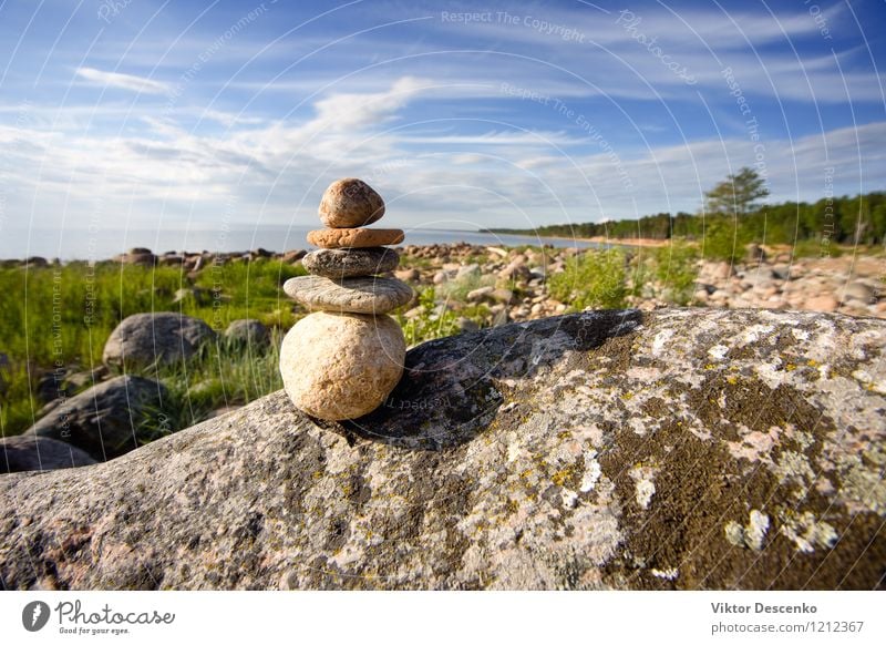 Rocks by the sea on one another pyramid Meditation Summer Beach Ocean Yoga Nature Sky Coast Stone White Peace Accumulation Pebble tower Zen Stack stability