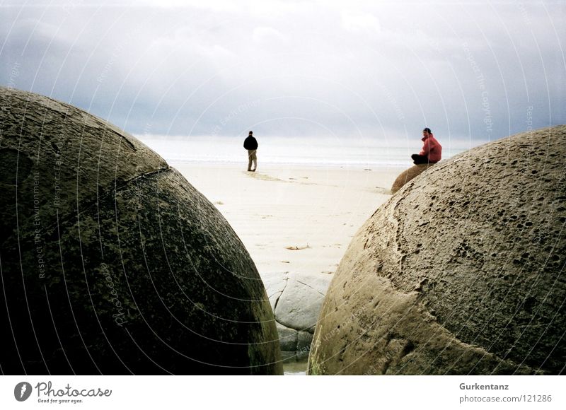 The eggs of Satan Moeraki Moeraki Boulder New Zealand Beach Coast Ocean Round South Island Autumn Stone Minerals boulders 2 persons hoirzont monolithic Ball