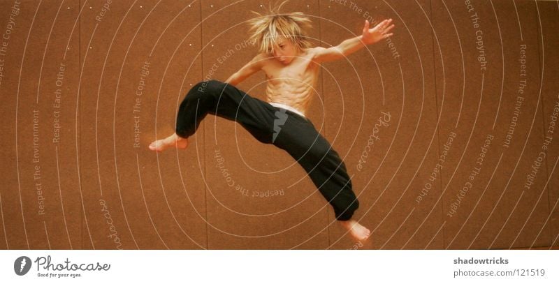 Jumpy 1 Capoeira Karate Chinese martial art Kick Hair and hairstyles Style Sports Gymnasium Human being custodial jump off Musculature Boy (child) Body